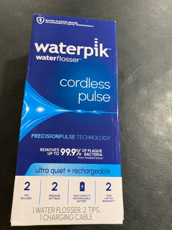 Photo 1 of Waterpik Cordless Pulse Rechargeable Portable Water Flosser for Teeth, Gums, Braces Care and Travel with 2 Flossing Tips, Waterproof, ADA Accepted, WF-20 White, Packaging May Vary