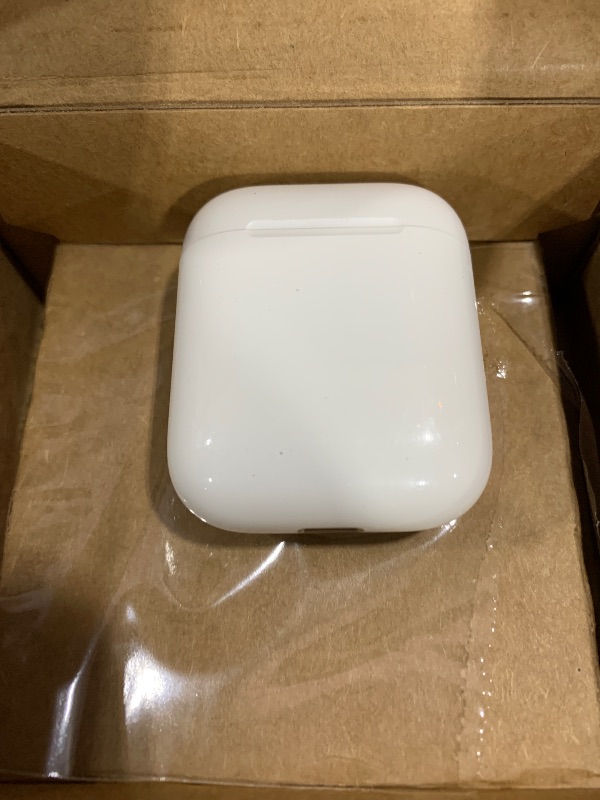 Photo 1 of Apple AirPods Wireless Ear Buds, Bluetooth Headphones with Lightning Charging Case Included, Over 24 Hours of Battery Life, Effortless Setup for iPhone