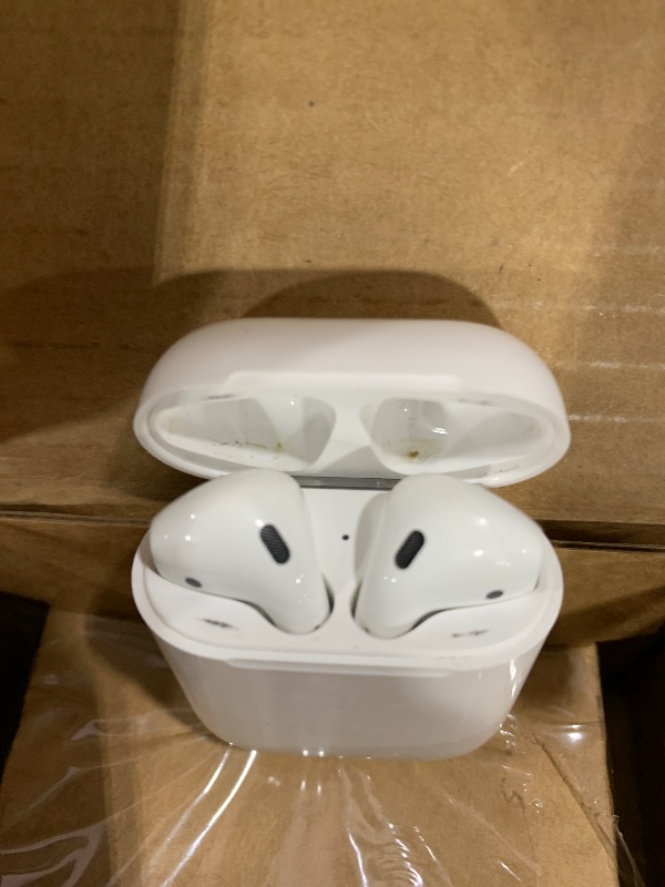 Photo 1 of Apple AirPods Wireless Ear Buds, Bluetooth Headphones with Lightning Charging Case Included, Over 24 Hours of Battery Life, Effortless Setup for iPhone