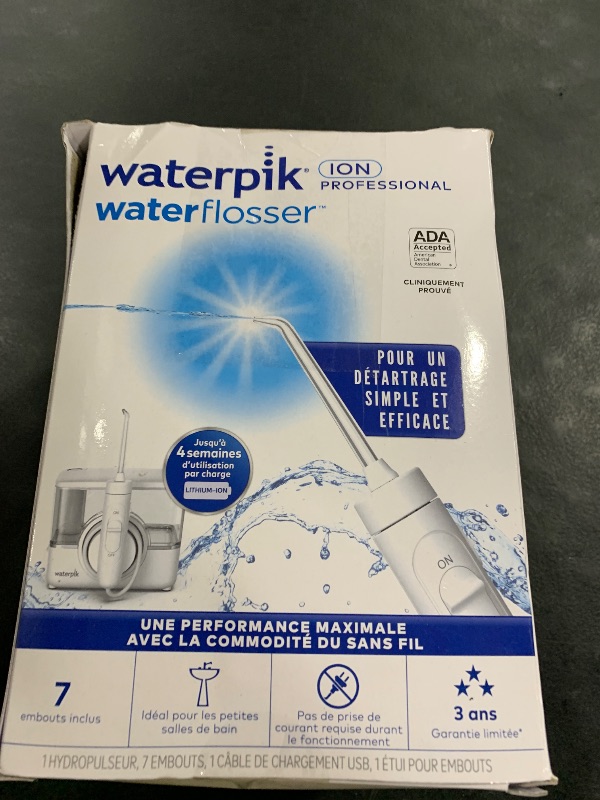 Photo 1 of Waterpik ION Professional Water Flosser, Rechargeable and Portable for Teeth, Gums, Braces, 10 Settings, 7 Flossing Tips For Multiple Users And Needs, ADA Accepted, WF-12 White, Packaging May Vary