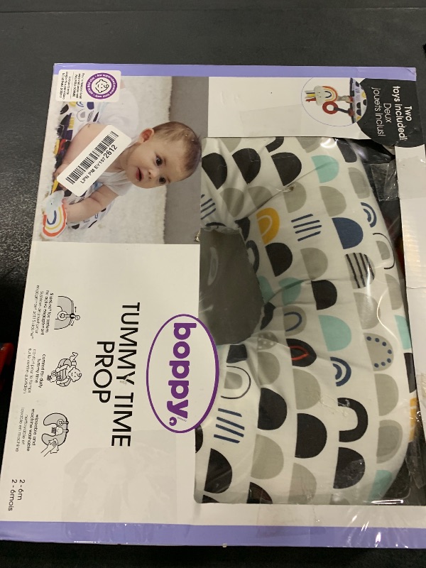 Photo 1 of Boppy Tummy Time Prop, Black and White Modern Rainbows with Teething Toys, A Smaller Size for Comfortable Tummy Time, Attached Toys Encourage Neck and Shoulder Strength Building