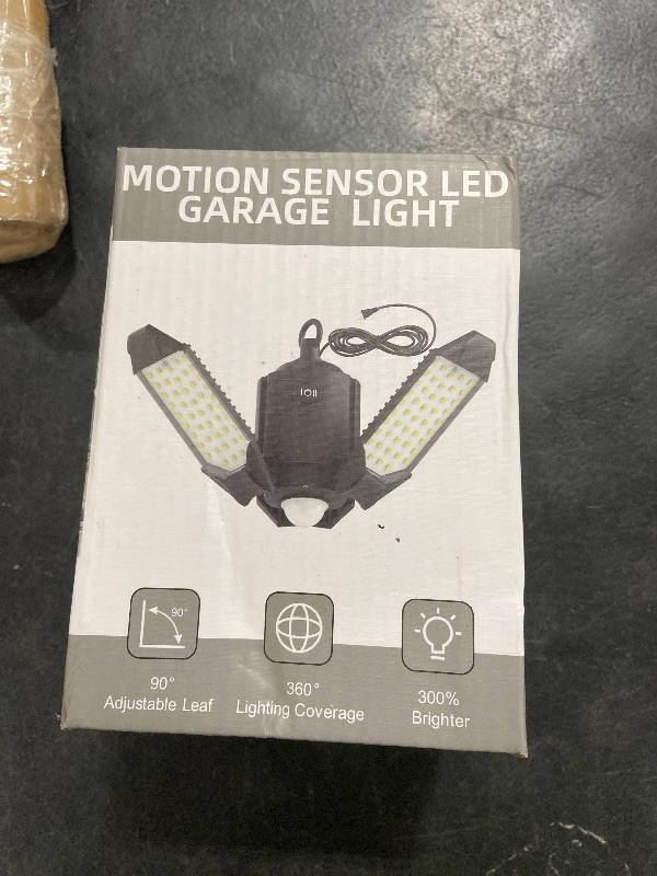 Photo 1 of Craftersmark Plug in Garage Light Motion Sensor, 80W 8000LM Motion Sensor Lights Indoor, Deformable LED Shop Motion Activated Bulb for Basement, Warehouse, Barn(1 Pack)