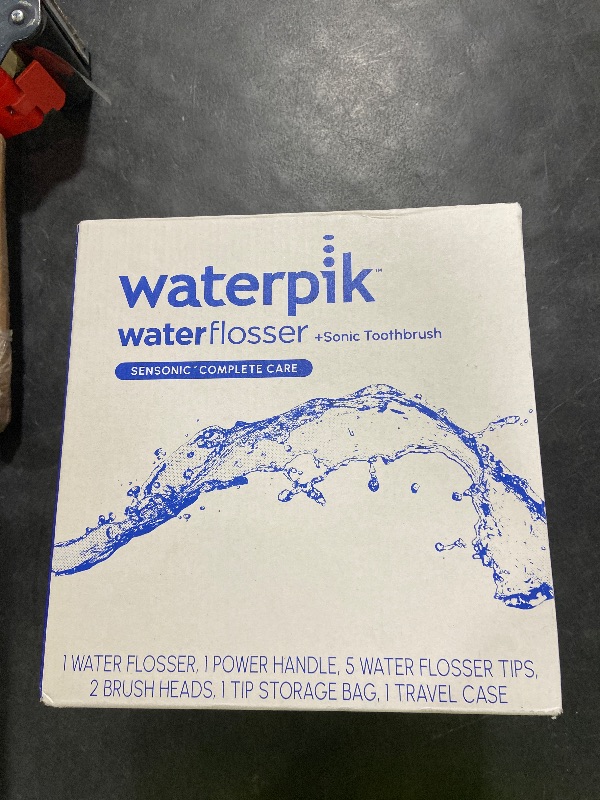 Photo 1 of Waterpik Sensonic Complete Care Water Flosser and Rechargeable Electric Toothbrush Combo Set for Teeth Cleaning and Flossing, CC-04, White, Packaging May Vary