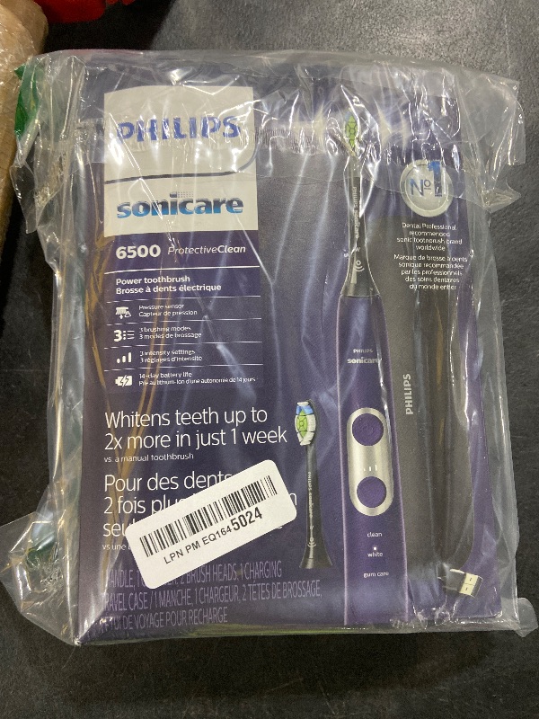 Photo 1 of PHILIPS Sonicare Protective Clean 6500 Rechargeable Electric Toothbrush with Charging Travel Case and Extra Brush Head, Deep Purple, 2 Count