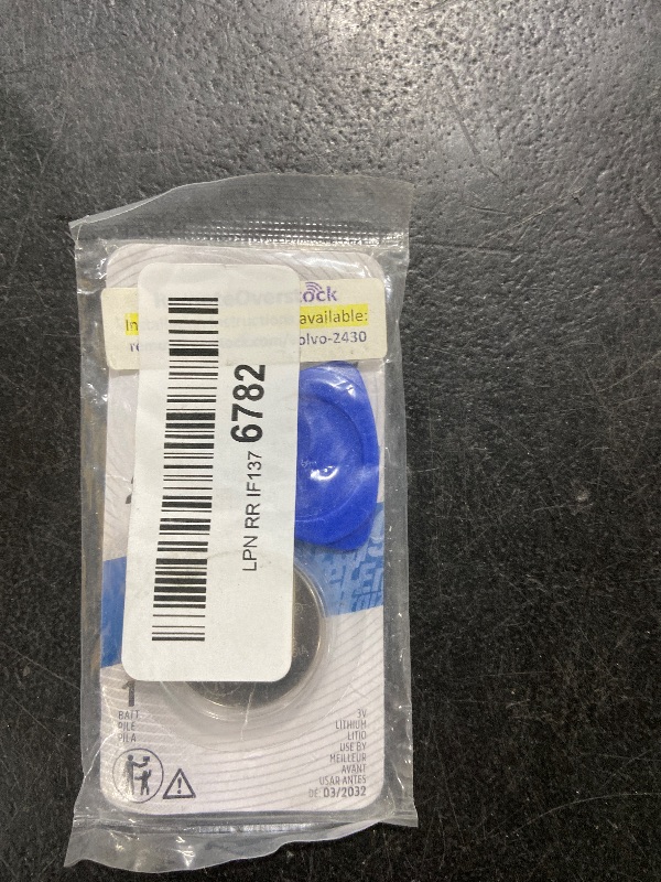 Photo 1 of key fob with batteries