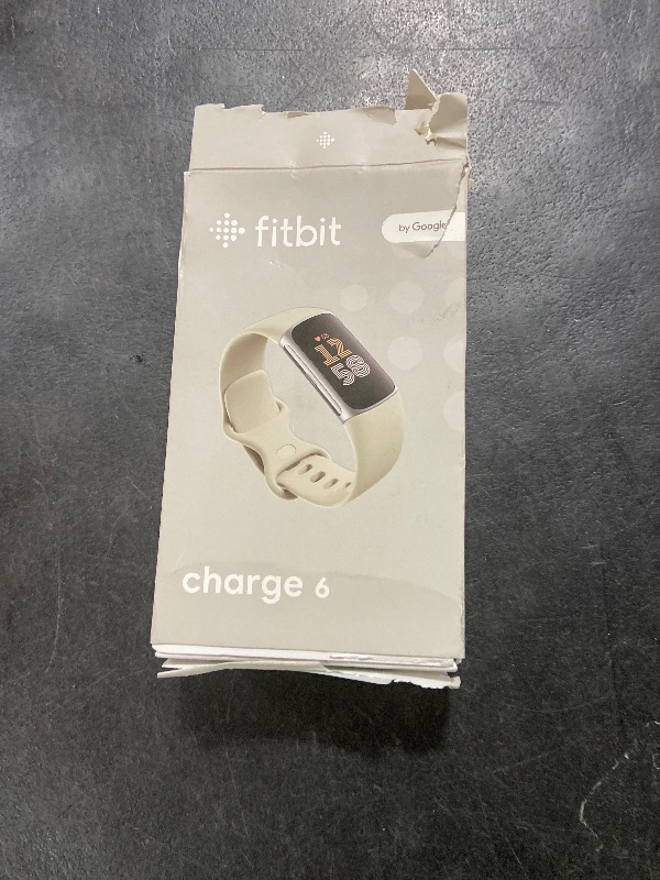 Photo 1 of Fitbit Charge 6 Fitness Tracker with Google apps, Heart Rate on Exercise Equipment, 6-Months Premium Membership Included, GPS, Health Tools and More, Porcelain/Silver, One Size (S & L Bands Included)