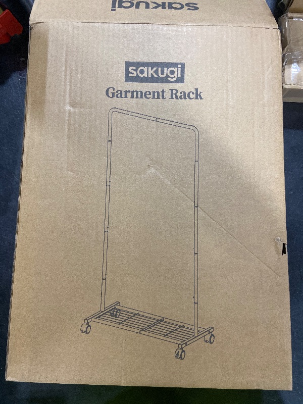 Photo 1 of Sakugi Clothes Rack - Clothing Rack with Storage Mesh Shelf & Casters, Heavy-Duty Metal Clothing Rack for Hanging Clothes, Dresses, Coats, Large Load Capacity, Easy Assembly, Black, 28.0"x14.0"x59.0"