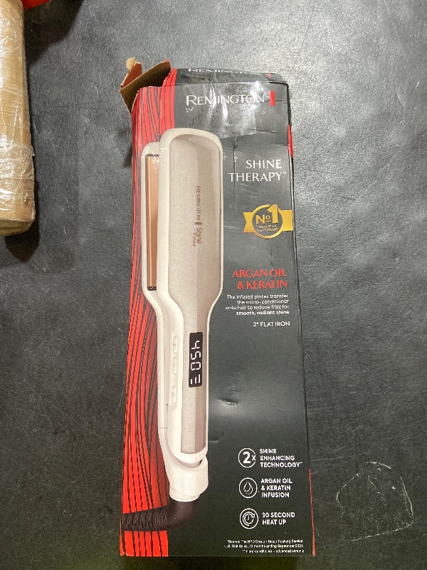 Photo 1 of Remington Shine Therapy 2 inch Hair Straightener, Flat Iron Infused with Argan Oil & Keratin, Professional Ceramic Flat Iron for Less Frizz, Shiny & Smooth Hot Styling Tools