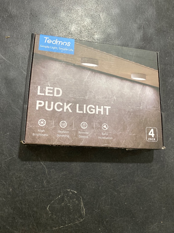 Photo 1 of USB Rechargeable LED Puck Lights with Remote Control, 2400mAh Battery Operated Push Lights Stick on Magnetic Tap Light for Closet Wireless Kitchen Under Cabinet Touch Lighting Shelf Press Button Light
