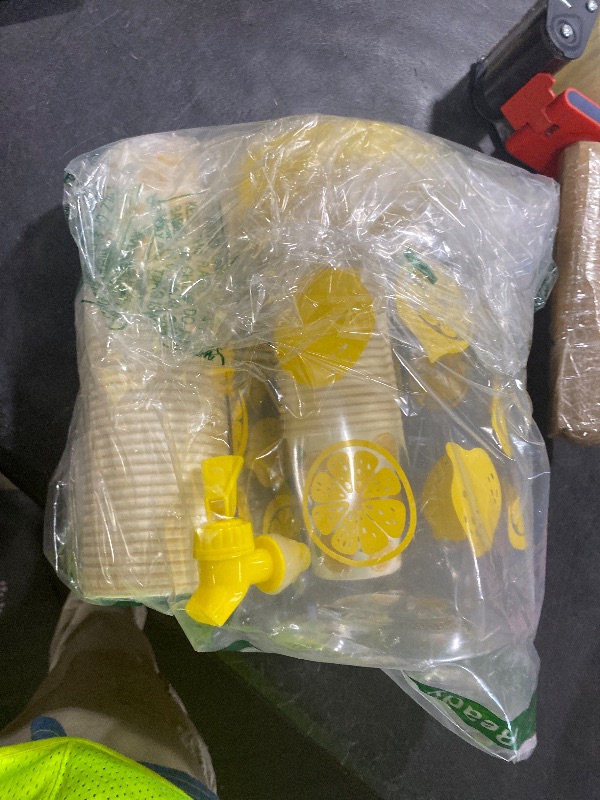 Photo 1 of Lemon Plastic Drink Dispenser and 50 Pcs Lemon Paper Party Cups 1 Gallon Iced Beverage Dispenser Tea Jar with Spigot and Carrying Lid Clear Dispenser for Lemonade Stand Lemon Juice Tea Beer
