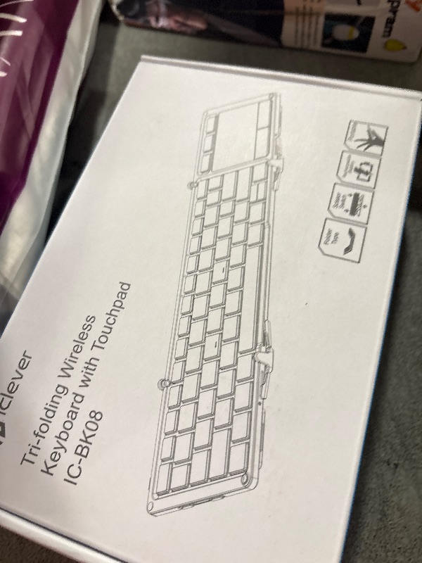 Photo 1 of iClever Foldable Keyboard with Touchpad, BK08 Portable Tri-Folding Bluetooth Keyboard for iPad, iPhone, Windows, Mac & Android — Connect Up to 3 Devices