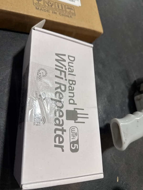 Photo 1 of WiFi Extender, WiFi Extender Signal Booster Dual-Band(5.8G&2.4G) Wireless Repeater Coverage to 12880 sq. ft & 105 Devices, 1-Tap Setup, Supports Ethernet Port, Faster Speed