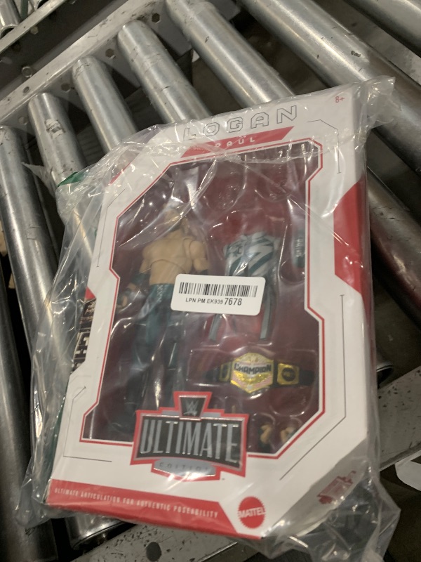 Photo 1 of Mattel WWE Ultimate Edition Action Figure & Accessories Set, Logan Paul 6-inch Collectible with Swappable Heads & Hands, 30 Articulation Points