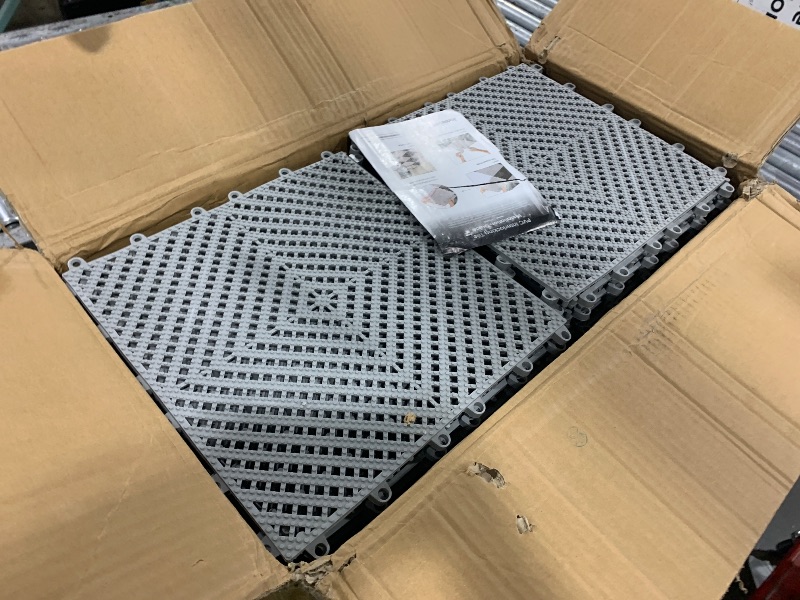 Photo 1 of Jocoevol 60-Pcs Interlocking Tile, Indoor/Outdoor Drainage Interlocking Floor Tiles 11.8" x 11.8", Anti-Slip Waterproof Soft PVC Splicing Flooring Tile for Garage Patio Pool Bathroom, Grey