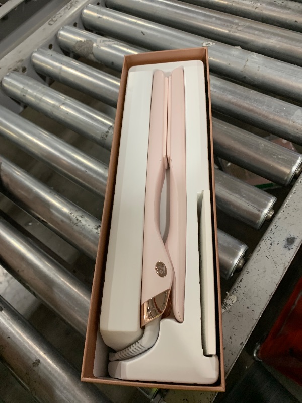 Photo 1 of T3 SinglePass Smooth X Professional Flat Iron with Extra-Long Ceramic Plates for Faster Styling, 9 Heat Settings for All Hair Types, For Straightening, Curling, and Waving