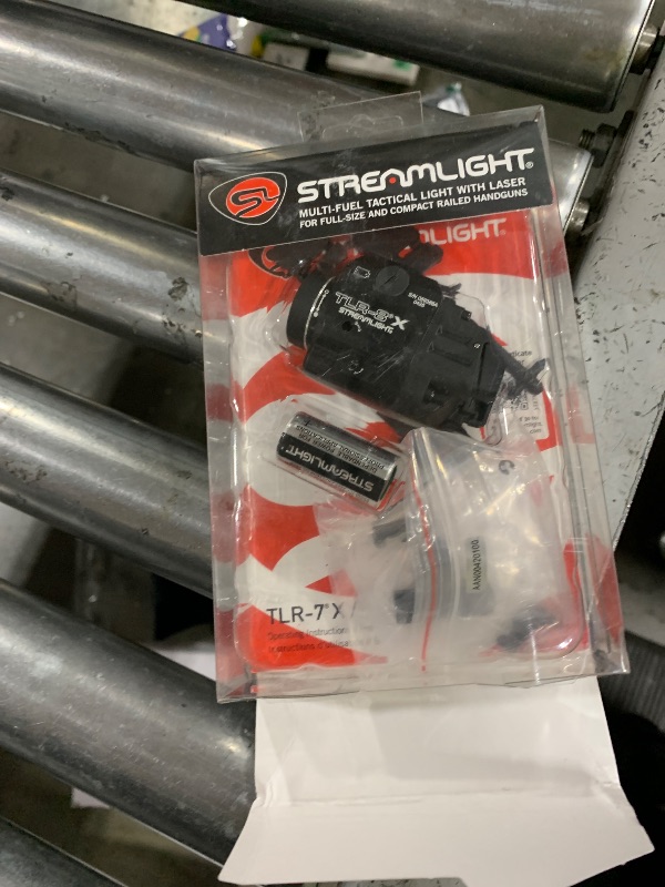 Photo 1 of Streamlight 69414 TLR-8 X 500-Lumen Tactical Weapon Light with Integrated Red Aiming Laser for Select Handguns, Includes Rear Switch Options, Mounting Kit, and Keys, Black