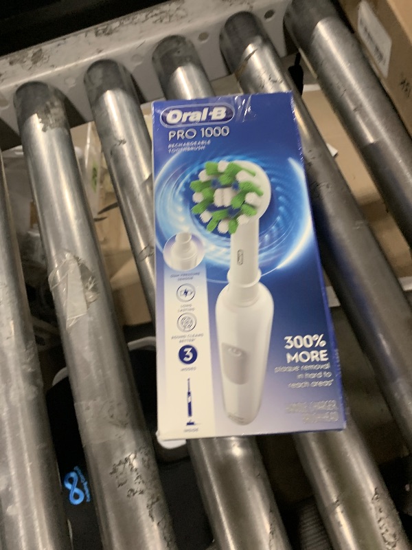 Photo 1 of Oral-B Pro 1000 Rechargeable Electric Toothbrush, White