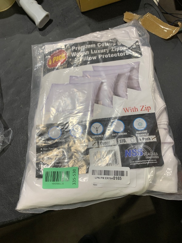 Photo 1 of Niagara 4 Pack King Pillow Protectors with Zipper, Premium Cotton Sateen Blend Tight Weave Lab Tested Non Noisy Zip Covers Breathable Non Crinky (20x36 Inches)