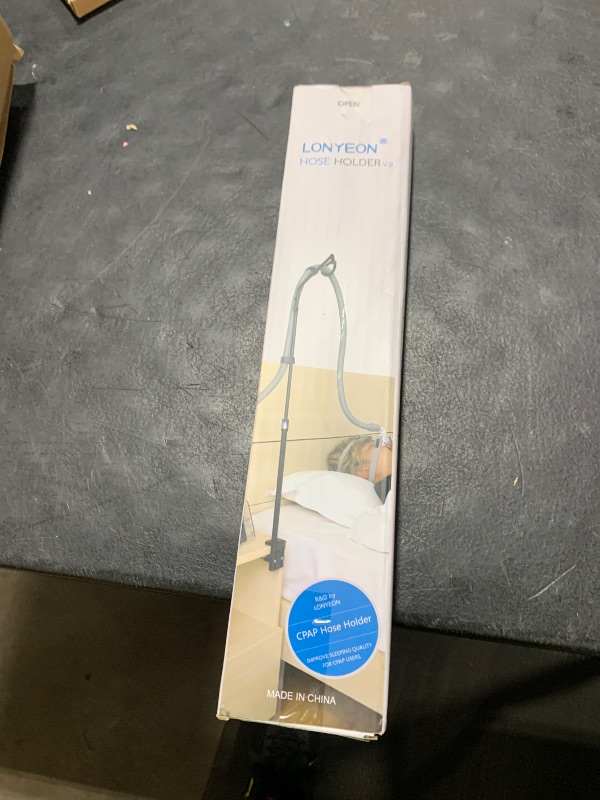 Photo 1 of LONYEON CPAP Hose Holder - Height Adjustable Hose Lift, Removable and Foldable - Hose Support Hanger Provide 2 Clamping Sides Prevents Avoid Tangling, Blockage and Leakage, Black