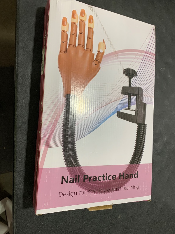 Photo 1 of LIONVISON Practice Hand for Acrylic Nails - Flexible Movable Practice Nail Hand with 100 Pcs Refill Nail Tips