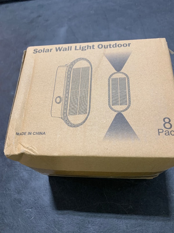 Photo 1 of Ellasay 8 Pack Fence Lights Solar Powered, Up and Down Focus LED Solar Wall Lights Outdoor, IP67 Waterproof Solar Lights for Outside Patio, Backyard,Porch,Railing,3 Color Modes