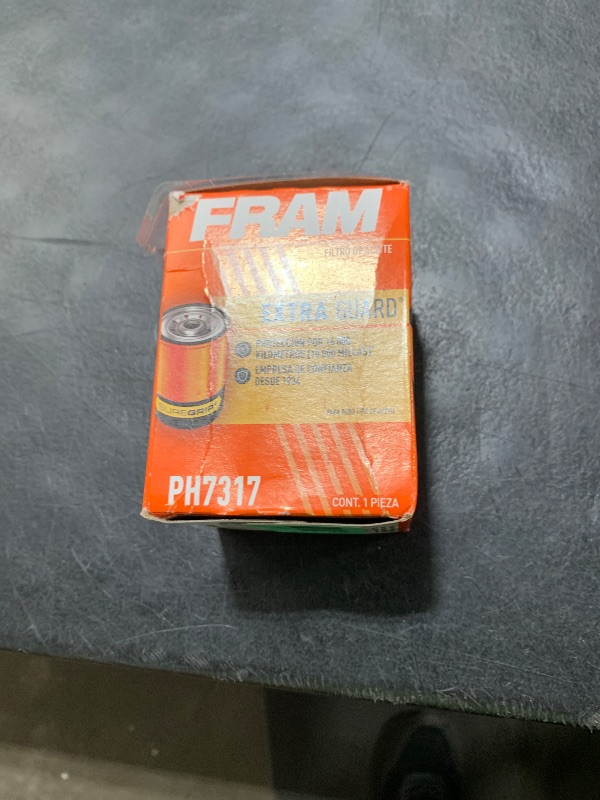 Photo 1 of FRAM Extra Guard PH7317 10K Mile Change Automotive Replacement Interval Spin-On Engine Oil Filter for Select Vehicle Model Years, Vehicle Engine Protection Oil Filter for Everyday Drivers