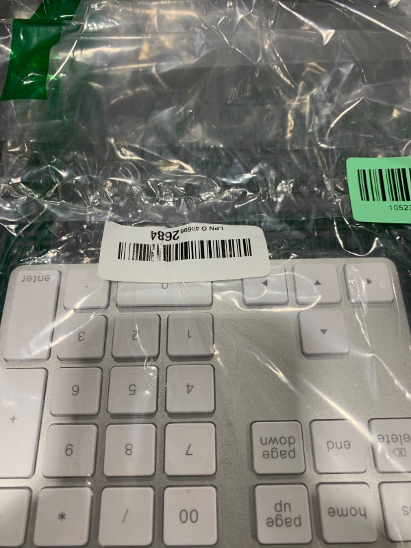 Photo 1 of Lekvey Bluetooth Number Pad, Aluminum Rechargeable Wireless Numeric Keypad Slim 34-Keys External Numpad Keyboard Data Entry for Laptop, MacBook, MacBook Air/Pro, iMac, Windows, Surface Pro - Silver