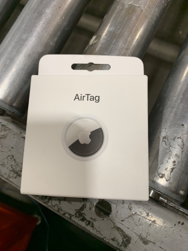 Photo 1 of Apple AirTag. Keep Track of and find Your Keys, Wallet, Luggage, Backpack, and More. Simple one-tap Set up with iPhone or iPad