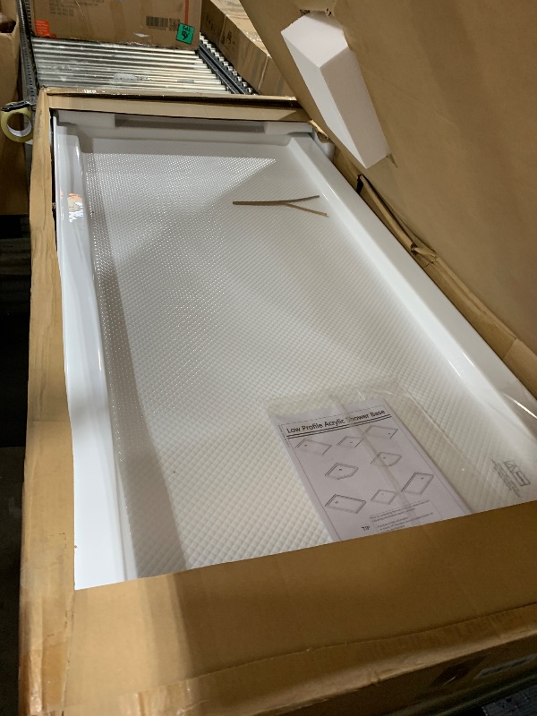 Photo 1 of DreamLine SlimLine 30 inch D x 60 inch W x 2 3/4 inch H Right Drain Single Threshold Shower Base i
