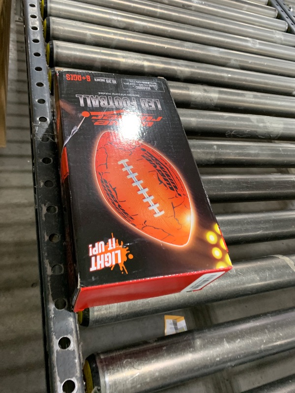 Photo 1 of Wave Runner LED Light-Up Football - Glow in The Dark Football Games- Size 10.35 in. with Pump and Batteries Included  (Orange W/Cracks)
