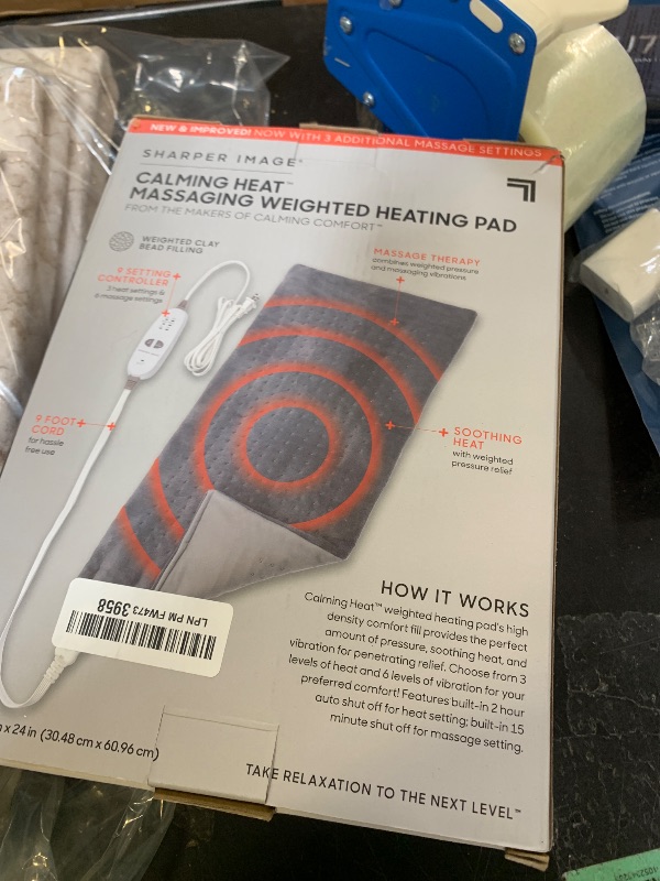 Photo 1 of Calming Heat Massaging Vibrations Weighted Heating Pad by Sharper Image | Temperature Settings, Auto Shut-Off Feature, Gift for Holidays, Women & Men | 3 Heat, 6 Massage, 12” x 24”, 4 lbs