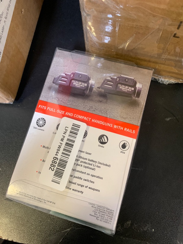 Photo 1 of Streamlight 69434 TLR-8A G Flex 500-Lumen Low Profile Pistol Light with Integrated Green Aiming Laser for Select Handguns, Includes Rear Switches, Mounting Kit, and Keys, Black