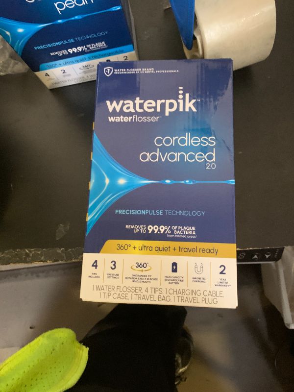 Photo 1 of Waterpik Cordless Advanced 2.0 Water Flosser For Teeth, Gums, Braces, Dental Care With Travel Bag and 4 Tips, ADA Accepted, Rechargeable, Portable, and Waterproof, White WP-580, Packaging May Vary