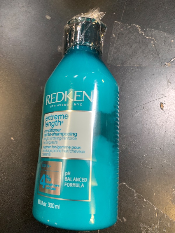 Photo 1 of **HALF USED** Redken Extreme Length Conditioner For Damaged Hair - Fortifies, Strengthens and Conditions Hair, Infused With Biotin & Castor Oil For Hair Growth, 10.1 Fl Oz