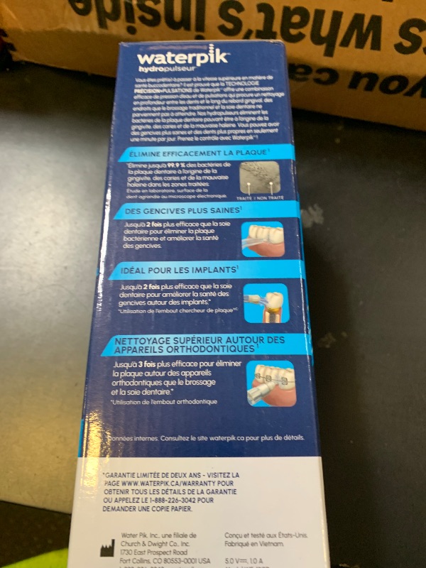 Photo 1 of Waterpik Cordless Pearl Rechargeable Portable Water Flosser for Teeth, Gums, Braces Care and Travel with 4 Flossing Tips - ADA Accepted, WF-13 White, Packaging May Vary