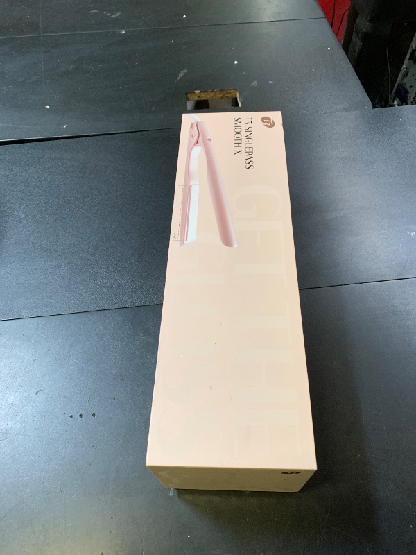 Photo 1 of T3 SinglePass Smooth X Professional Flat Iron with Extra-Long Ceramic Plates for Faster Styling, 9 Heat Settings for All Hair Types, For Straightening, Curling, and Waving