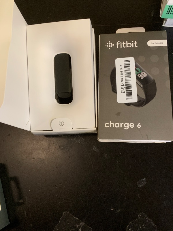 Photo 1 of Fitbit Charge 6 Fitness Tracker with Google apps, Heart Rate on Exercise Equipment, 6-Months Premium Membership Included, GPS, Health Tools and More, Obsidian/Black, One Size (S & L Bands Included)