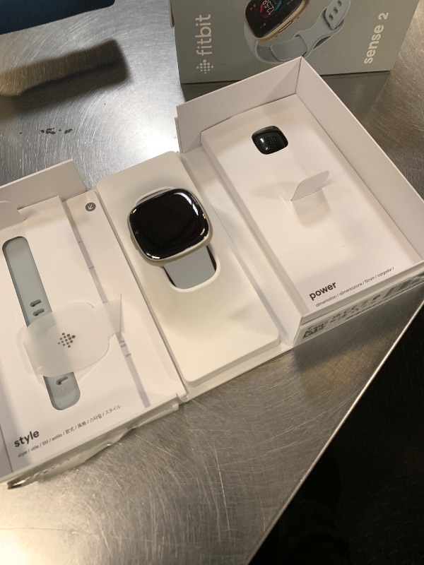 Photo 1 of Fitbit Sense 2 Advanced Health and Fitness Smartwatch with Tools to Manage Stress and Sleep, ECG App, SpO2, 24/7 Heart Rate and GPS, Blue Mist/Pale Gold, One Size (S & L Bands Included)