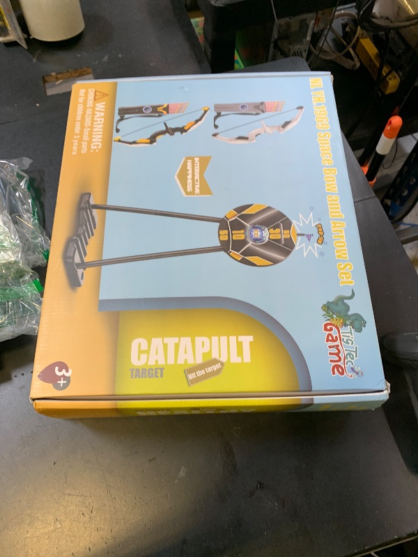 Photo 1 of ARCHERY SET, BOW, ARROW, AND TARGET 