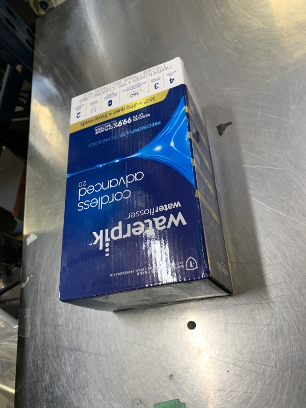 Photo 1 of Waterpik Cordless Advanced 2.0 Water Flosser For Teeth, Gums, Braces, Dental Care With Travel Bag and 4 Tips, ADA Accepted, Rechargeable, Portable, and Waterproof, Black WP-582, Packaging May Vary