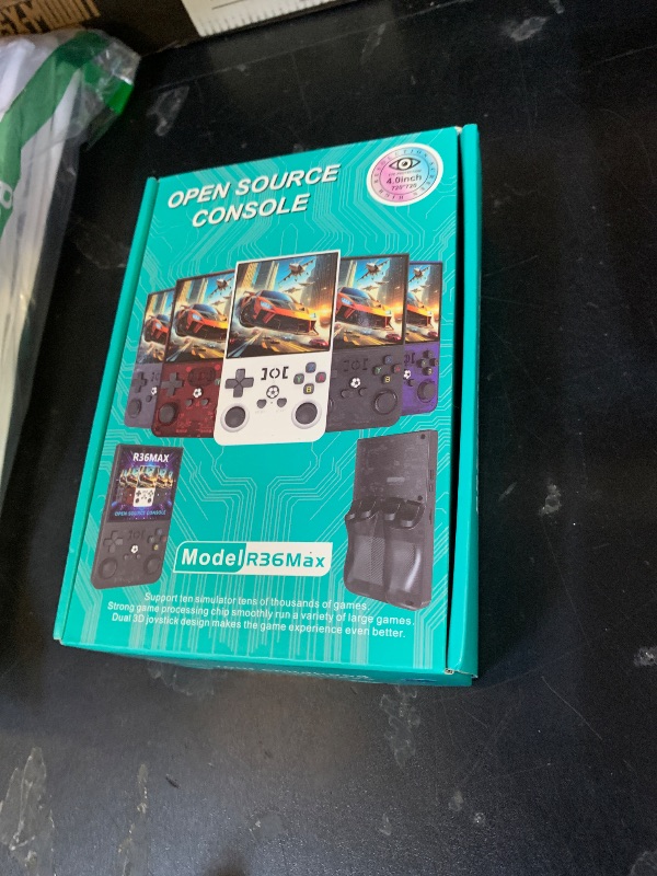 Photo 1 of ?R36MAX 4000mAh Portable Rechargeable Handheld Retro Game Console,Comfort Non-Slip Handheld Standing Retro Game Console with 64G TF Car,4.0-inch Screen,for Office,Blue