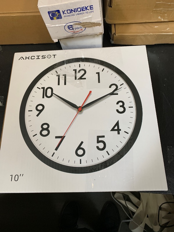 Photo 1 of AKCISOT Wall Clock 10 Inch Silent Non-Ticking Modern Clocks Battery Operated - Analog Small Classic for Office, Home, Bathroom, Kitchen, Bedroom, School, Living Room(Black)
