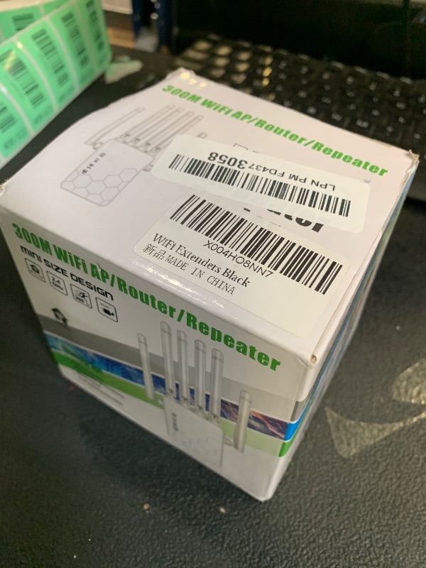 Photo 1 of WiFi Extenders Signal Booster for Home Long Range Up to 11000 sq.ft for 35+ Devices,Internet Extender WiFi Booster, Long Range WiFi Extender,with 6 Antennas 360° Full Coverage Ethernet Port (Black)