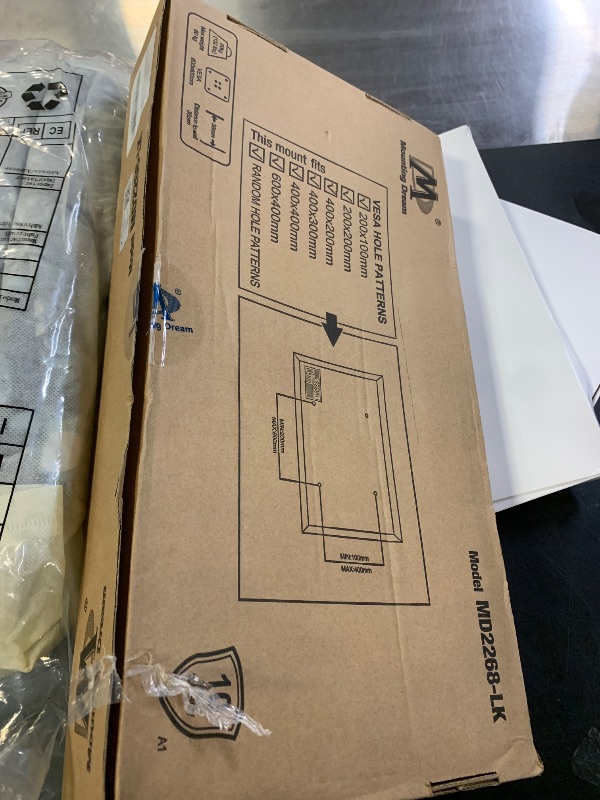 Photo 1 of **INCOMPLETE** Mounting Dream TV Wall Mount for Most 37-75 Inch TVs, Universal Tilt TV Mount Fit 16", 18", 24" Stud with Loading Capacity 132lbs, Max Vesa 600 x 400mm, Low Profile Flat Wall Mount TV Bracket