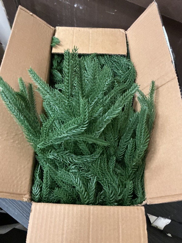 Photo 1 of Hananona 4 Pcs 6 Ft Artificial Norfolk Pine Garlands, Real Touch Winter Pine Garland, Green Artificial Greenery Garland for Table, Mantle, Wall, Indoor, Outdoor Christmas Decorations (4, 6 FT)