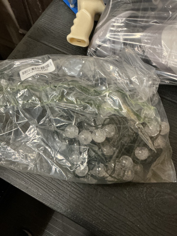 Photo 1 of Red and White Solar Christmas String Lights, 2-Pack Total 100 LED 64FT Crystal Globe Solar Lights Outdoor Waterproof, Christmas Decorations with 8 Lighting Modes for Xmas Tree Wedding Patio Party