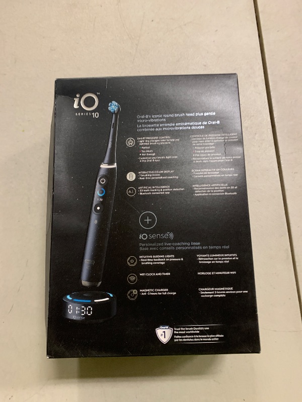 Photo 1 of Oral-B iO Series 10 Rechargeable Electric Toothbrush with Visible Pressure Sensor to Protect Gums, 2 Min Timer, 7 Cleaning Settings, 4 Replacement Toothbrush Heads, and Charging Travel Case, Black