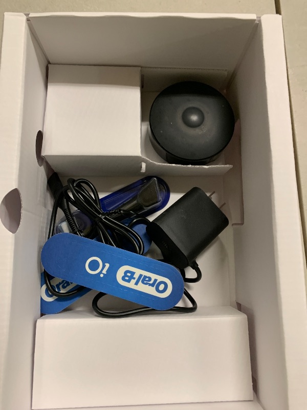 Photo 1 of Oral-B iO Series 10 Rechargeable Electric Toothbrush with Visible Pressure Sensor to Protect Gums, 2 Min Timer, 7 Cleaning Settings, 4 Replacement Toothbrush Heads, and Charging Travel Case, Black