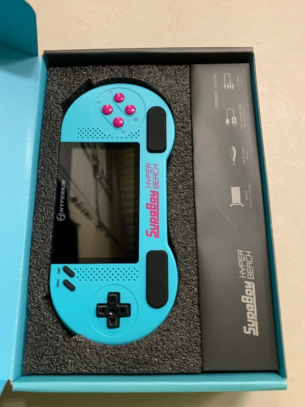 Photo 1 of Hyperkin SupaBoy Portable Pocket Console for SNES/SFC, Gaming console System - Super Nintendo Entertainment System (Super NES) / Super Famicom - (Hyper Beach)