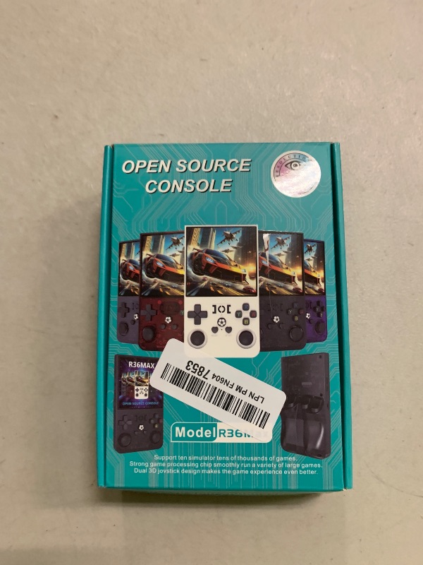 Photo 1 of ?R36MAX 4000mAh Portable Rechargeable Handheld Retro Game Console,Comfort Non-Slip Handheld Standing Retro Game Console with 64G TF Car,4.0-inch Screen,for Office,Black